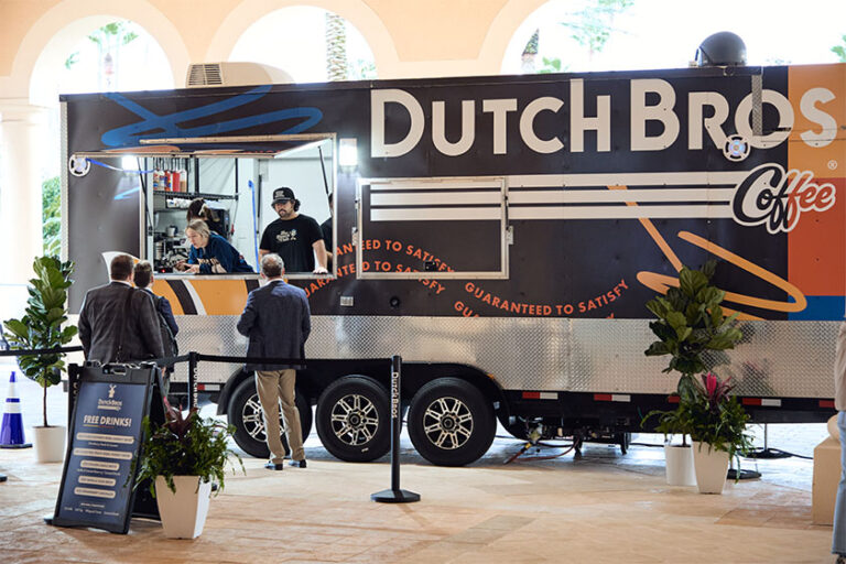 People ordering coffee from Dutch Bros Coffee truck