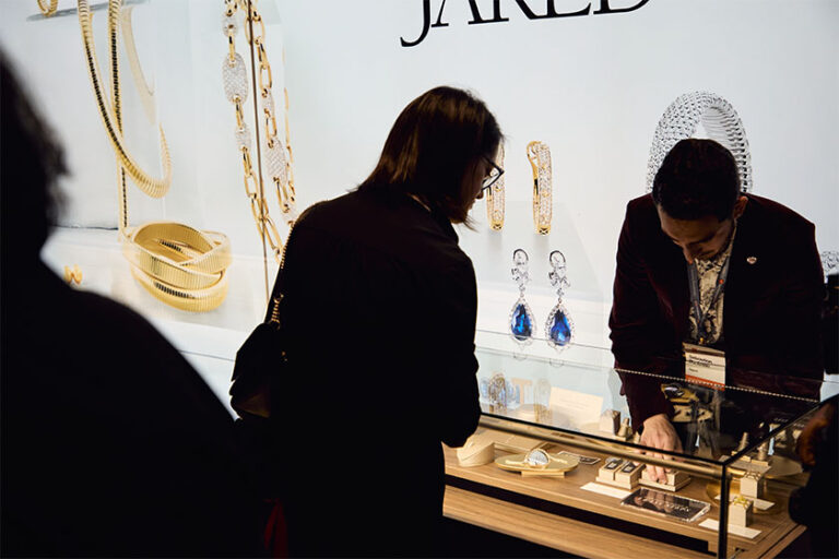 Women looking into a case of jewlery