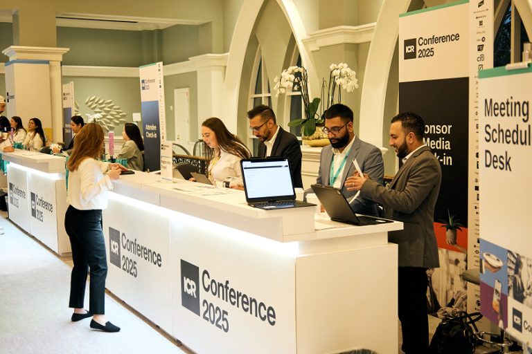 Attendees checking in to ICR Conference 2025