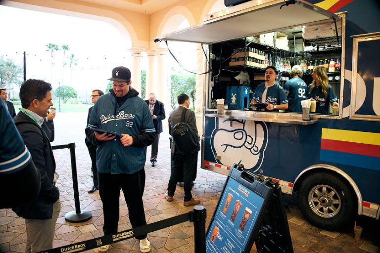 Attendees ordering coffee at Dutch Bros activation