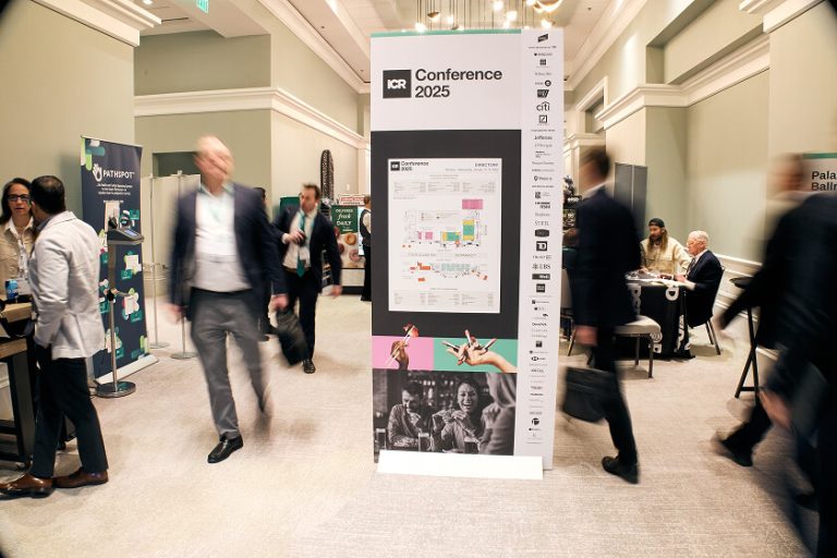 Attendees moving through event space